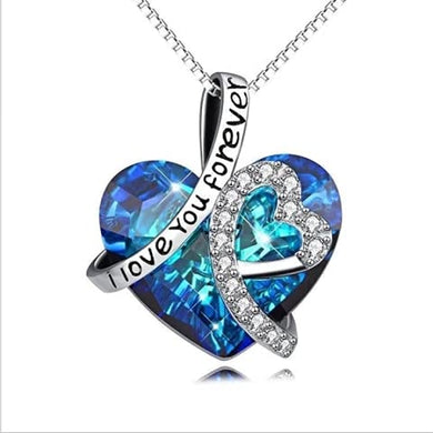 Ocean blue crystal heart necklace with sterling silver plated details and 'I love you forever' inscription.