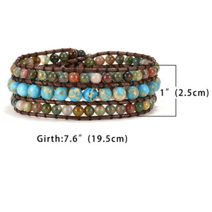 Handmade triple-row wrap bracelet with turquoise and stone beads on a brown cord.