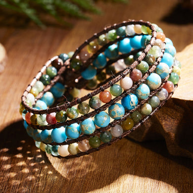 Triple-row turquoise stone bead wrap bracelet.