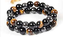 Load image into Gallery viewer, Tiger&#39;s Eye, Hematite, Black Obsidian round bead bracelet for protection.
