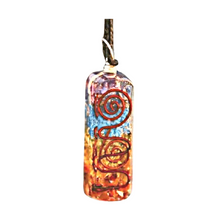 Load image into Gallery viewer, Orgone pendant necklace with chakra stones, coiled copper detail on a brown cord.
